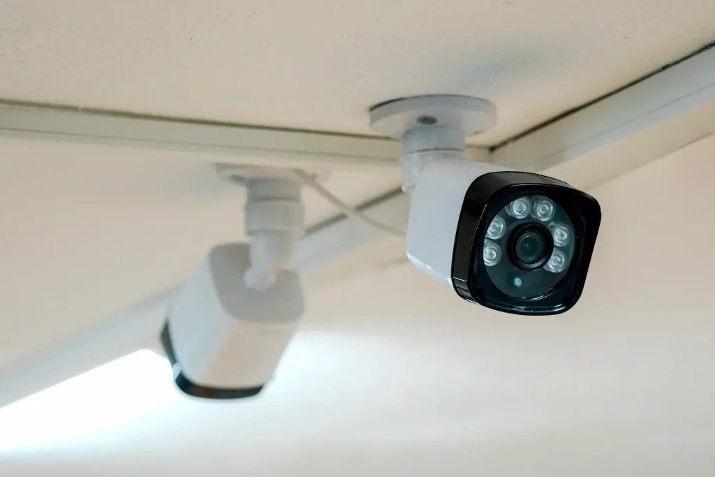 security cameras in the warehouse, attached to ceiling