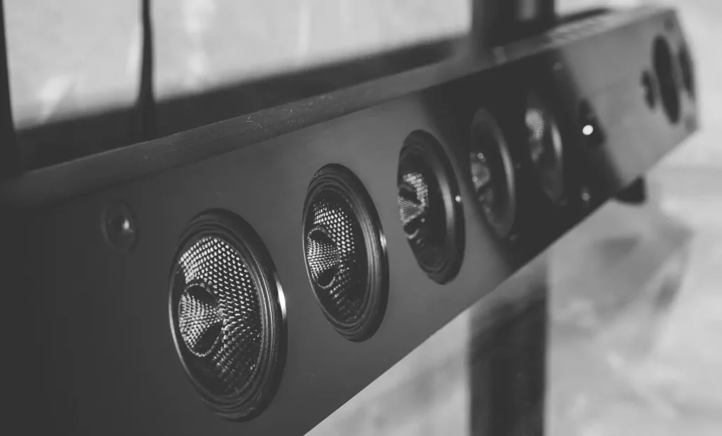 Soundbar vs surround sound: close-up view of soundbar speaker drivers