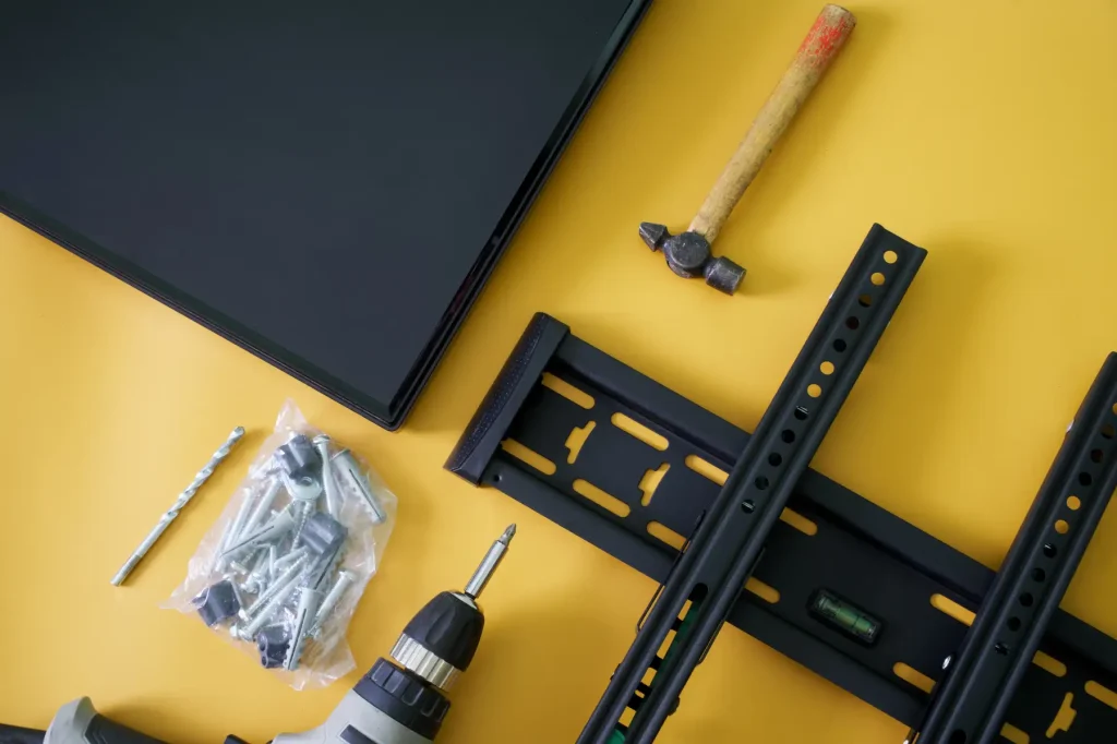 TV wall mount bracket and tools for mounting television on wall